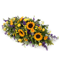 Sunflower and delphinium Casket Spray