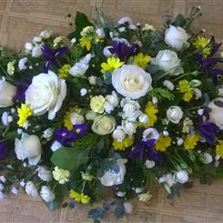 White, Yellow and Purple Double ended casket spray