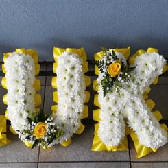 Lettering in whites and yellows