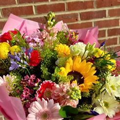 Delux Sunny days handtied bouquet 