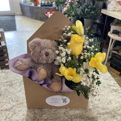 Floral envelope including teddy bear